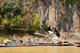 Laos: Tour boats moored below the Pak Ou Caves, Luang Prabang